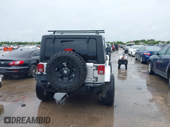 2012 Jeep Wrangler Unlimited Call of Duty MW3 with VIN 1C4BJWFG7CL281844, listed as a IAAI auction lot 42494946 with 93,669 mi miles and . Bid and sale history available at DreamBid. Image 16.