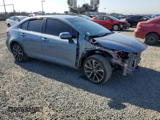 2022 Toyota Corolla SE with VIN JTDS4MCEXN3503519, listed as a Copart auction lot 51928405 with 32,900 mi miles and Salvage Title. Bid and sale history available at carsss.com. Image 4.