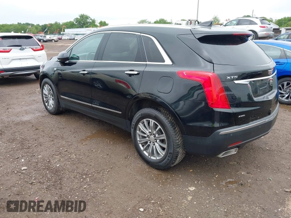 2017 Cadillac XT5 Luxury AWD with VIN 1GYKNDRS9HZ149675, listed as a IAAI auction lot 42329454 with 77,257 mi miles and . Bid and sale history available at DreamBid. Image 3.