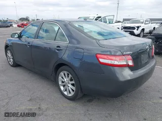 2010 Toyota Camry with VIN 4T1BF3EK5AU068156, listed as a IAAI auction lot 42035585 with 221,889 mi miles. Bid and sale history available at carsss.com. Image 3.