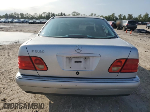 1999 Mercedes-Benz E-Class with VIN WDBJF65H9XA903481, listed as a Copart auction lot 79516914 with 201,080 mi miles and Salvage Title. Bid and sale history available at carsss.com. Image 6.