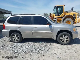 2005 GMC Envoy SLE with VIN 1GKDS13S652390259, listed as a IAAI auction lot 41825258 with 162,172 mi miles. Bid and sale history available at carsss.com. Image 13.