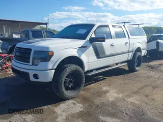 2014 Ford F-150 XL with VIN 1FTFW1ET0EFC63966, listed as a IAAI auction lot 42172143 with 155,335 mi miles and . Bid and sale history available at DreamBid. Image 2.