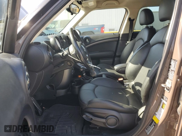2013 MINI Countryman S ALL4 z VIN WMWZC5C51DWP30390, wystawiony jako Copart lot #59869105 z przebiegiem 111 843 mil mil oraz Szkoda całkowita • Salvage title. Historia ofert i sprzedaży dostępna na DreamBid. Obrazek 7.