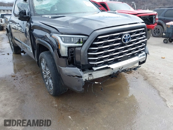 2022 Toyota Tundra Capstone Hybrid with VIN 5TFVC5DB6NX005465, listed as a IAAI auction lot 41589222 with 28,452 mi miles and . Bid and sale history available at DreamBid. Image 12.
