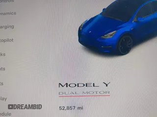 2023 Tesla Model Y Performance with VIN 7SAYGDEF9PF582908, listed as a IAAI auction lot 41930957 with 52,857 mi miles and . Bid and sale history available at DreamBid. Image 7.