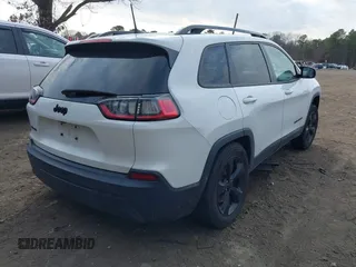 2021 Jeep Cherokee Latitude Plus with VIN 1C4PJMLBXMD185415, listed as a IAAI auction lot 41773843 with 62,770 mi miles and . Bid and sale history available at DreamBid. Image 4.