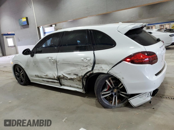 2013 Porsche Cayenne GTS with VIN WP1AD2A24DLA76344, listed as a Copart auction lot 83570884 with 63,704 mi miles and Salvage title. Bid and sale history available at DreamBid. Image 2.