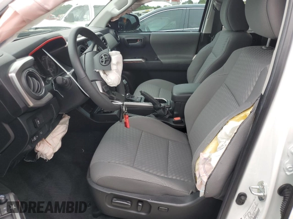 2023 Toyota Tacoma SR with VIN 3TMCZ5AN1PM632989, listed as a Copart auction lot 55642925 with 40,740 mi miles and Salvage title. Bid and sale history available at DreamBid. Image 7.