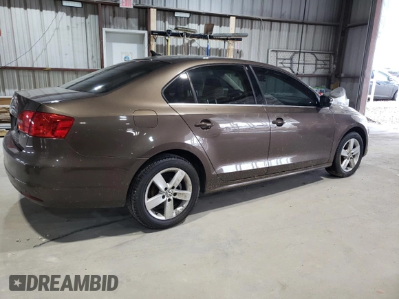 2014 Volkswagen Jetta TDI w/Premium/Nav with VIN 3VWLL7AJ3EM352687, listed as a Copart auction lot 63249725 with 122,678 mi miles and Clean title. Bid and sale history available at DreamBid. Image 3.