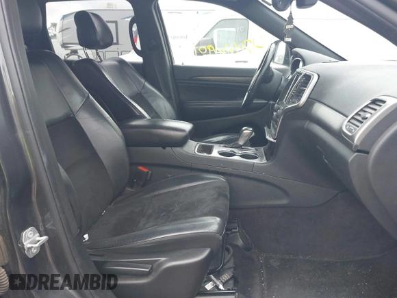 2018 Jeep Grand Cherokee Altitude z VIN 1C4RJFAGXJC190814, wystawiony jako IAAI lot #42660901 z przebiegiem 127 632 mil mil oraz . Historia ofert i sprzedaży dostępna na DreamBid. Obrazek 5.
