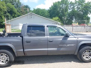 2001 Dodge Dakota with VIN 1B7HL2AX01S338909, listed as a IAAI auction lot 42639655 with 111,858 mi miles and . Bid and sale history available at DreamBid. Image 14.