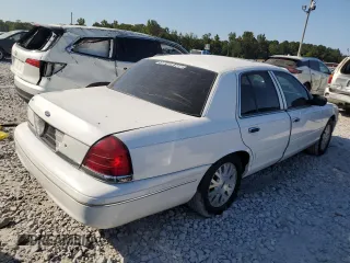 2004 Ford Crown Victoria LX z VIN 2FDFP74W34X164453, wystawiony jako Copart lot #75922204 z przebiegiem 103 546 mil mil oraz Szkoda całkowita • Salvage title. Historia ofert i sprzedaży dostępna na DreamBid. Obrazek 3.