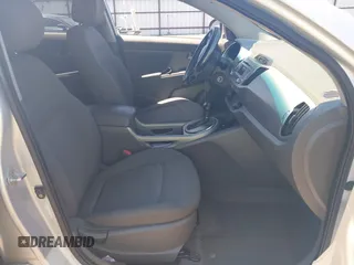 2013 Kia Sportage LX with VIN KNDPBCA24D7352828, listed as a IAAI auction lot 42685744 with 156,805 mi miles and . Bid and sale history available at DreamBid. Image 5.