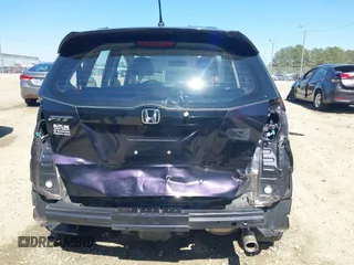2013 Honda Fit Sport with VIN JHMGE8H59DC001939, listed as a IAAI auction lot 41885102 with 113,639 mi miles. Bid and sale history available at carsss.com. Image 6.