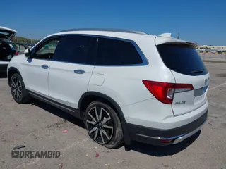 2022 Honda Pilot Touring 7-Passenger с VIN 5FNYF5H66NB034248, выставлен на аукционе IAAI как лот 41777362 с пробегом 26 611 миль миль и . История ставок и продаж доступна на DreamBid. Изображение 3.