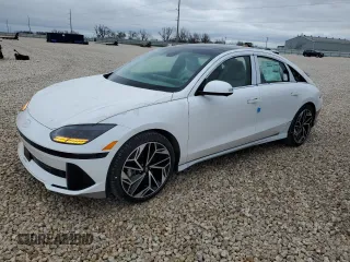 2023 Hyundai Ioniq 6 Limited z VIN KMHM54AA2PA052554, wystawiony jako Copart lot #74362523 z przebiegiem 5 mil mil oraz . Historia ofert i sprzedaży dostępna na DreamBid. Obrazek 1.