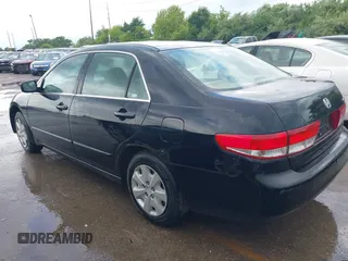 2003 Honda Accord LX with VIN 1HGCM563X3A005819, listed as a IAAI auction lot 42521193 with 105,903 mi miles and . Bid and sale history available at DreamBid. Image 3.