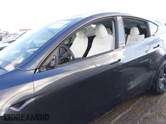 2024 Tesla Model Y Long Range with VIN 7SAYGDEE0RA300064, listed as a IAAI auction lot 41640541 with 5,049 mi miles and . Bid and sale history available at DreamBid. Image 15.
