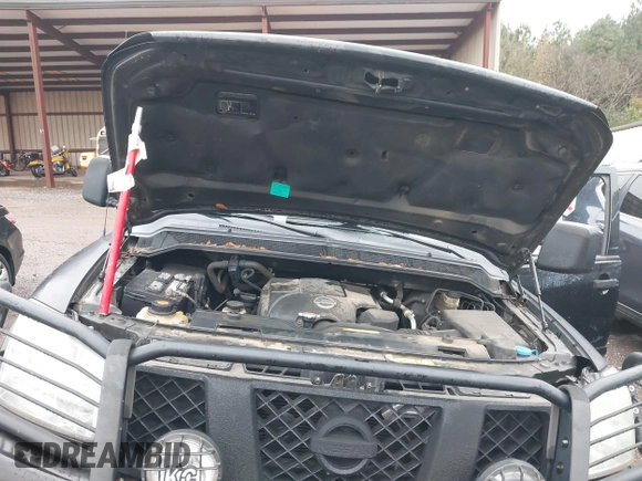 2007 Nissan Titan SE with VIN 1N6BA07A17N212890, listed as a IAAI auction lot 41034412 with 211,881 mi miles and . Bid and sale history available at DreamBid. Image 10.