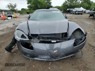 2011 Chevrolet Corvette 1LT z VIN 1G1YE2DW8B5105978, wystawiony jako Copart lot #75264194 z przebiegiem 144 427 mil mil oraz Szkoda całkowita • Salvage title. Historia ofert i sprzedaży dostępna na DreamBid. Obrazek 5.