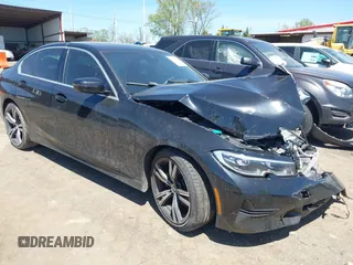 2020 BMW 3 Series 330i with VIN 3MW5R1J0XL8B30004, listed as a IAAI auction lot 42101708 with Not provided miles and . Bid and sale history available at DreamBid. Image 1.