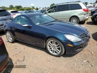 2007 Mercedes-Benz SLK-Class 3.0L with VIN WDBWK54F17F147014, listed as a Copart auction lot 70086814 with 106,197 mi miles and Clean Title. Bid and sale history available at carsss.com. Image 4.