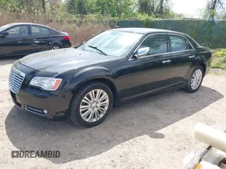 2013 Chrysler 300 with VIN 2C3CCAKG2DH645193, listed as a IAAI auction lot 42105459 with 230,063 mi miles. Bid and sale history available at carsss.com. Image 17.