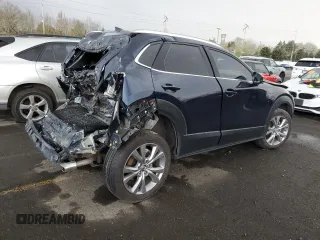 2020 Mazda CX-30 Premium z VIN 3MVDMBEM8LM121954, wystawiony jako Copart lot #51322965 z przebiegiem Nie podano mil oraz Nie do naprawy • Non repairable. Historia ofert i sprzedaży dostępna na DreamBid. Obrazek 3.