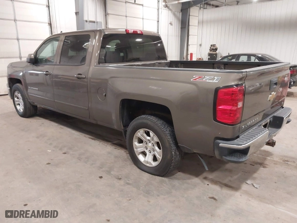 2015 Chevrolet Silverado 1500 LT with VIN 3GCUKREC5FG207488, listed as a IAAI auction lot 41472511 with 167,448 mi miles. Bid and sale history available at carsss.com. Image 3.