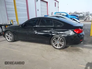2015 BMW 4 Series 428i with VIN WBA4A9C52FGL85228, listed as a IAAI auction lot 41228043 with 152,729 mi miles and . Bid and sale history available at DreamBid. Image 14.