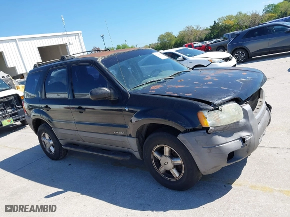 2001 Ford Escape XLT with VIN 1FMYU031X1KF31462, listed as a IAAI auction lot 41784891 with 372,527 mi miles. Bid and sale history available at carsss.com. Image 13.