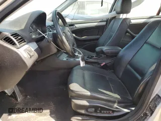 2004 BMW 3 Series 325xi with VIN WBAEU33404PM60151, listed as a Copart auction lot 57120235 with 116,859 mi miles and Salvage title. Bid and sale history available at DreamBid. Image 7.