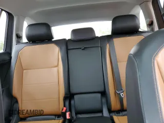 2018 Volkswagen Tiguan SEL с VIN 3VV3B7AX6JM202210, выставлен на аукционе Copart как лот 54373505 с пробегом 159 638 миль миль и Списание • Salvage title. История ставок и продаж доступна на DreamBid. Изображение 10.