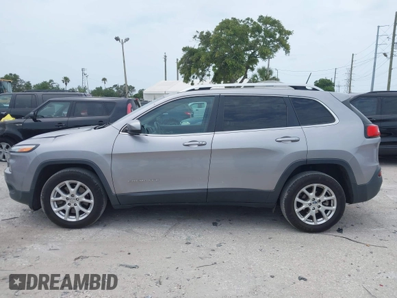 2018 Jeep Cherokee Latitude Plus with VIN 1C4PJLLB0JD534992, listed as a IAAI auction lot 42212429 with 125,928 mi miles and . Bid and sale history available at DreamBid. Image 14.