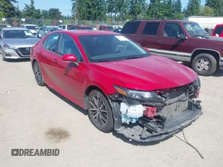 2023 Toyota Camry SE z VIN 4T1G11AKXPU176800, wystawiony jako IAAI lot #42463432 z przebiegiem 54 350 mil mil oraz . Historia ofert i sprzedaży dostępna na DreamBid. Obrazek 1.