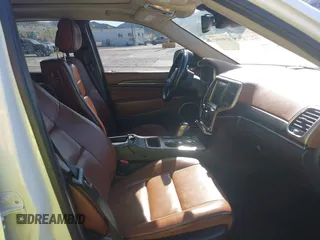 2016 Jeep Grand Cherokee with VIN 1C4RJEJM8GC321506, listed as a IAAI auction lot 41969587 with 226,072 mi miles and . Bid and sale history available at DreamBid. Image 5.