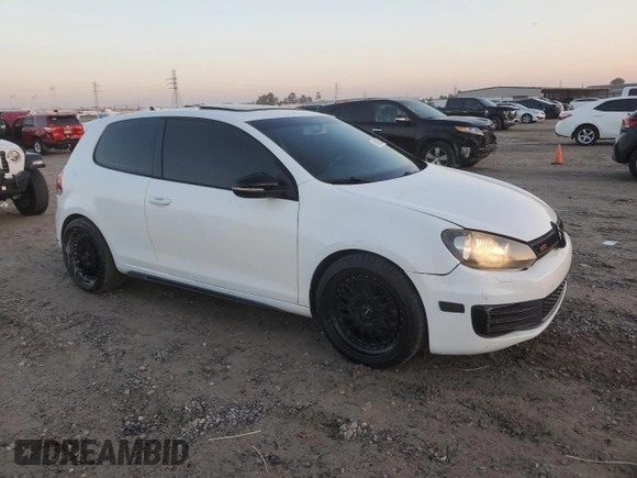 2012 Volkswagen GTI w/Conv & Sunroof with VIN WVWEV7AJXCW252931, listed as a Copart auction lot 84538064 with 126,899 mi miles and Salvage title. Bid and sale history available at DreamBid. Image 4.