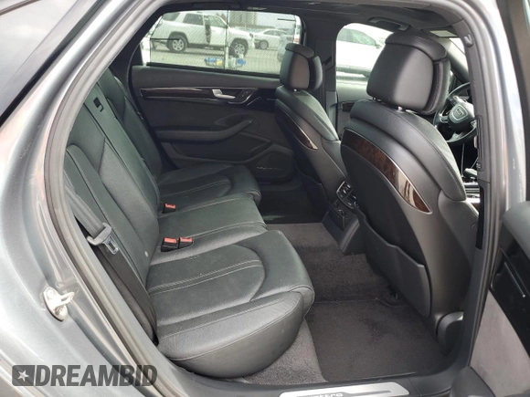 2018 Audi A8 z VIN WAU44AFD0JN000586, wystawiony jako Copart lot #73373174 z przebiegiem 45 183 mil mil oraz Szkoda całkowita • Salvage title. Historia ofert i sprzedaży dostępna na DreamBid. Obrazek 10.
