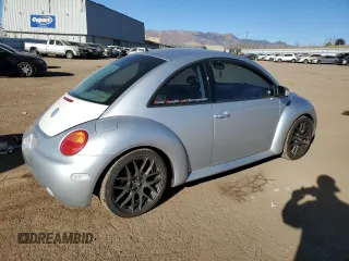 2004 Volkswagen Beetle with VIN 3VWCD31C54M409221, listed as a Copart auction lot 83323024 with 116,352 mi miles and Salvage Title. Bid and sale history available at DreamBid. Image 3.