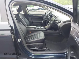 2020 Ford Fusion SEL z VIN 3FA6P0CD9LR183400, wystawiony jako IAAI lot #42271491 z przebiegiem 52 020 mil mil oraz . Historia ofert i sprzedaży dostępna na DreamBid. Obrazek 5.
