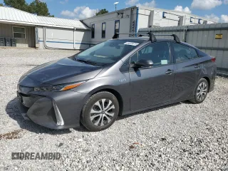 2022 Toyota Prius LE z VIN JTDKAMFP5N3220080, wystawiony jako Copart lot #54329075 z przebiegiem 131 647 mil mil oraz Czysty tytuł • Clean title. Historia ofert i sprzedaży dostępna na DreamBid. Obrazek 1.