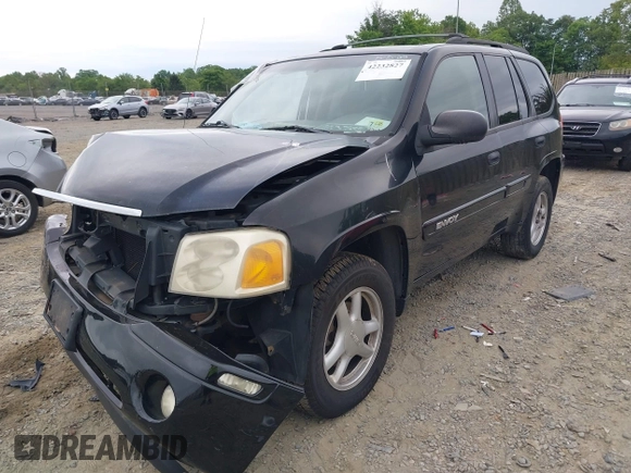 2004 GMC Envoy SLT z VIN 1GKDT13S142113238, wystawiony jako IAAI lot #42232827 z przebiegiem 185 136 mil mil oraz . Historia ofert i sprzedaży dostępna na DreamBid. Obrazek 2.