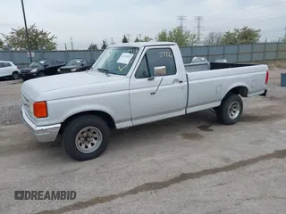 1991 Ford F-150 Special with VIN 2FTEF15Y7MCB07571, listed as a IAAI auction lot 42112922 with 75,013 mi miles. Bid and sale history available at carsss.com. Image 2.