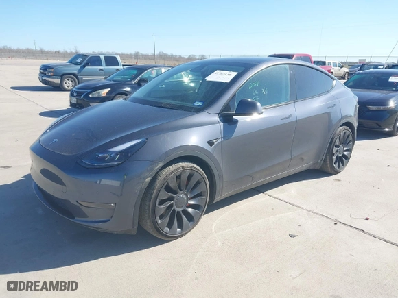 2022 Tesla Model Y Performance with VIN 7SAYGDEFXNF516963, listed as a IAAI auction lot 41765138 with 11,761 mi miles. Bid and sale history available at carsss.com. Image 18.