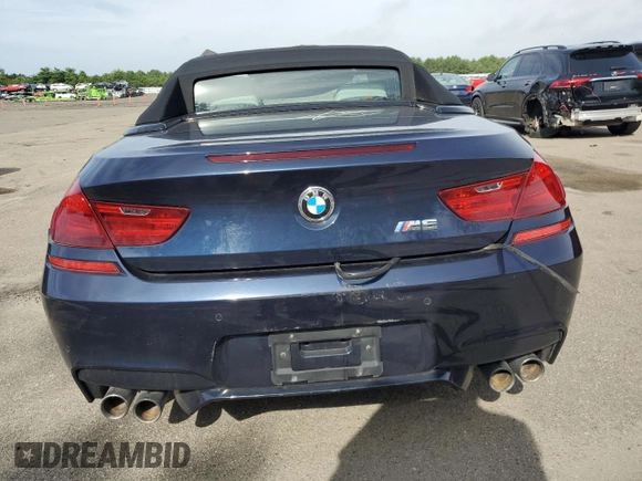 2015 BMW M6 with VIN WBSLZ9C59FD651474, listed as a Copart auction lot 60882454 with Not provided miles and Salvage title. Bid and sale history available at DreamBid. Image 6.