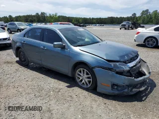 2012 Ford Fusion SEL z VIN 3FAHP0JA1CR182047, wystawiony jako Copart lot #56521525 z przebiegiem 200 523 mil mil oraz Szkoda całkowita • Salvage title. Historia ofert i sprzedaży dostępna na DreamBid. Obrazek 4.