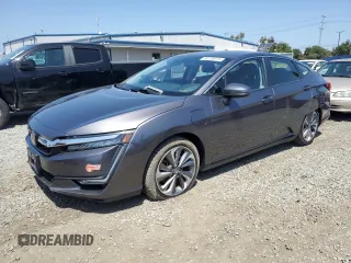2018 Honda Clarity Touring z VIN JHMZC5F36JC014495, wystawiony jako Copart lot #56139675 z przebiegiem 75 020 mil mil oraz Szkoda całkowita • Salvage title. Historia ofert i sprzedaży dostępna na DreamBid. Obrazek 1.