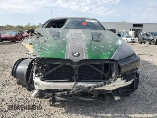 2021 BMW M5 z VIN WBS83CH08MCH12191, wystawiony jako Copart lot #52732775 z przebiegiem 36 935 mil mil oraz Czysty tytuł • Clean title. Historia ofert i sprzedaży dostępna na DreamBid. Obrazek 5.