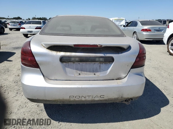 2005 Pontiac Grand Prix with VIN 2G2WP522551286641, listed as a Copart auction lot 63907535 with 148,938 mi miles and Clean title. Bid and sale history available at DreamBid. Image 6.